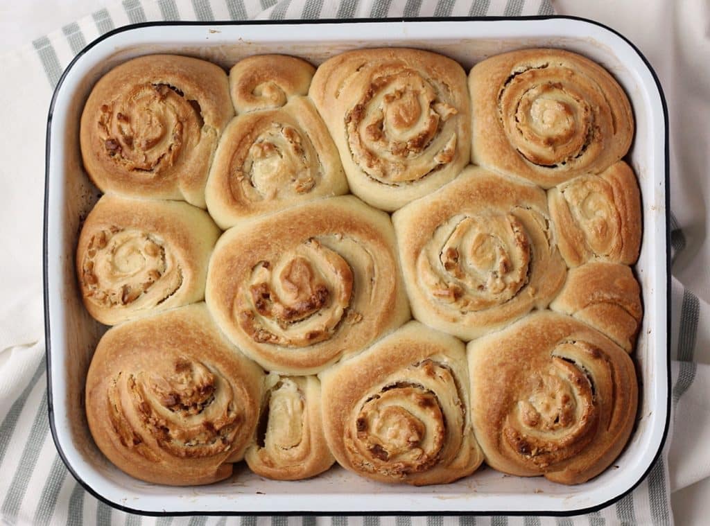 sourdough sweet roll buns in enameled pan