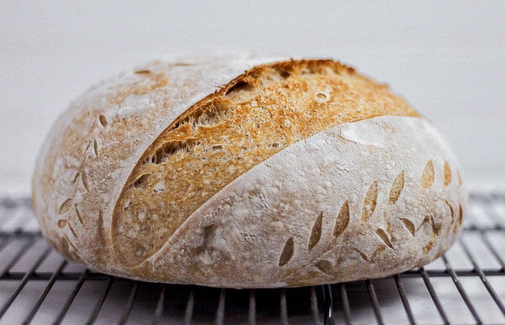 sourdough bread with intricate scoring design