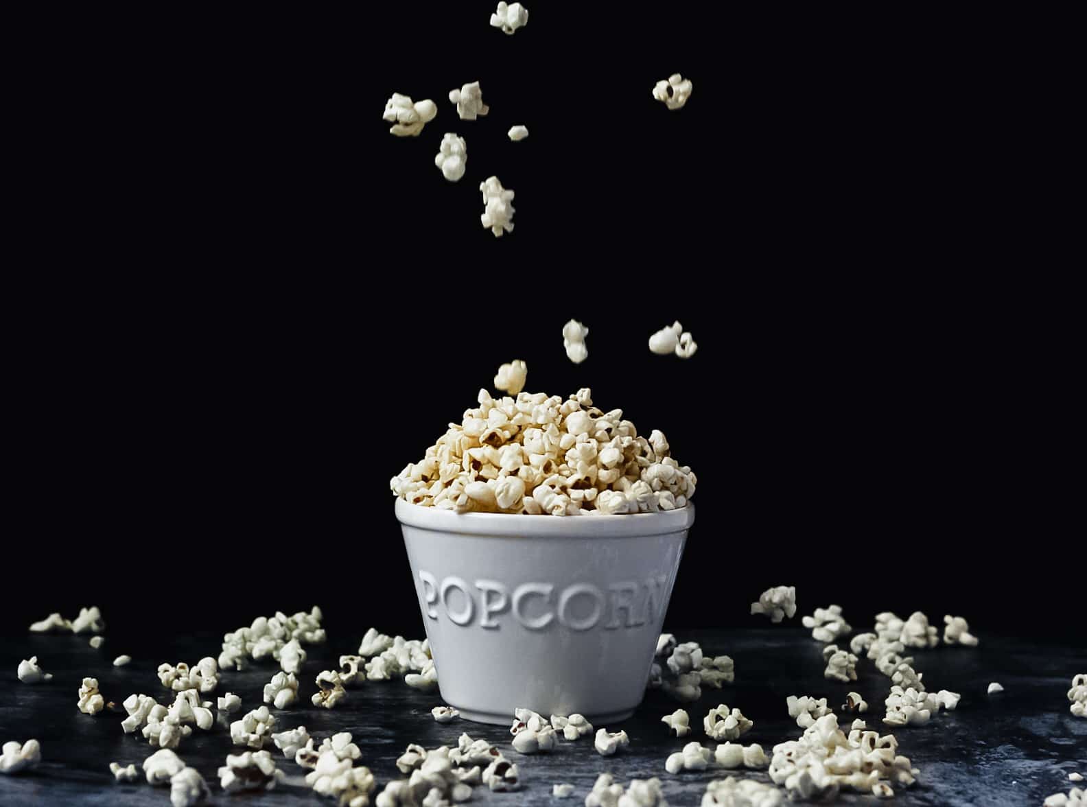 brown butter popcorn in ceramic popcorn bowl
