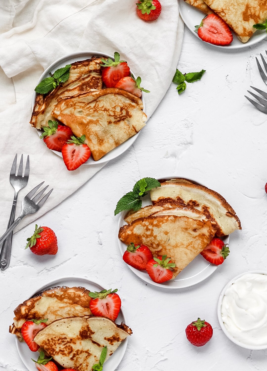 sourdough discard crepes with fresh strawberries