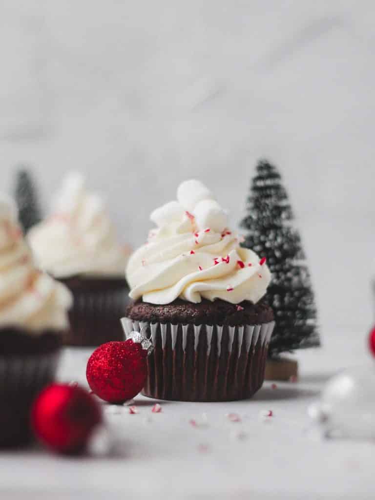 peppermint hot chocolate cupcakes with whipped cream frosting