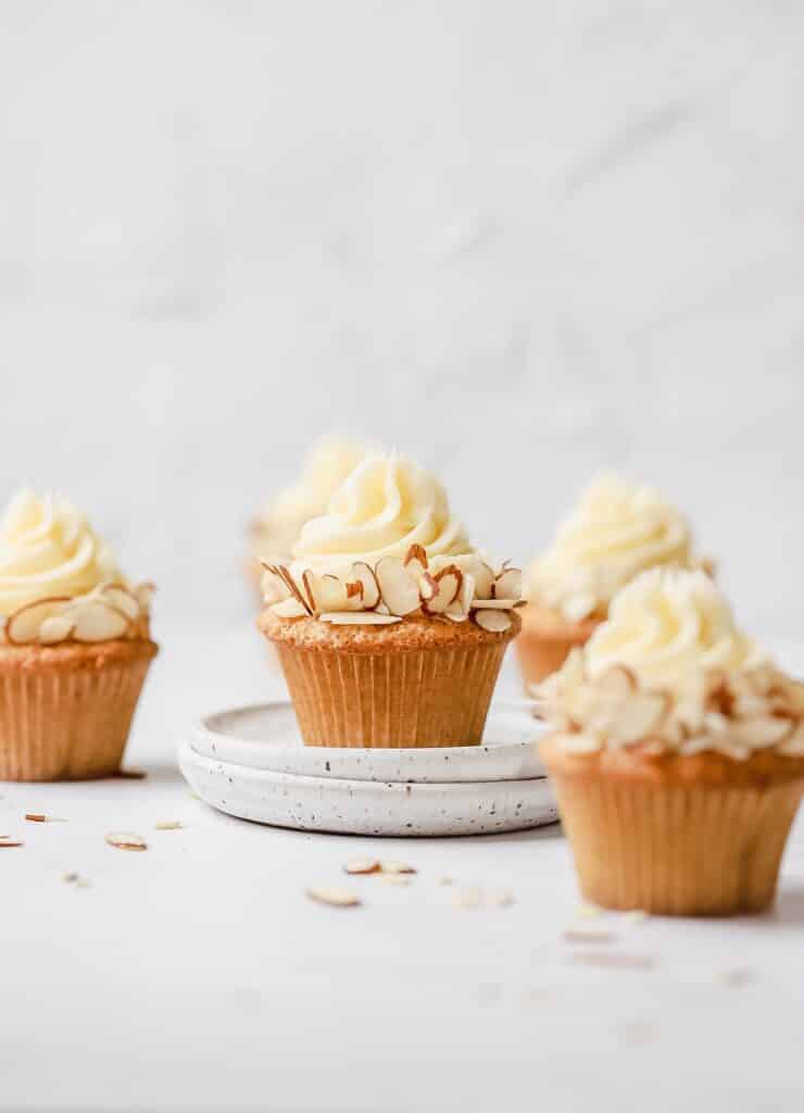 brown butter almond cupcakes on a plate