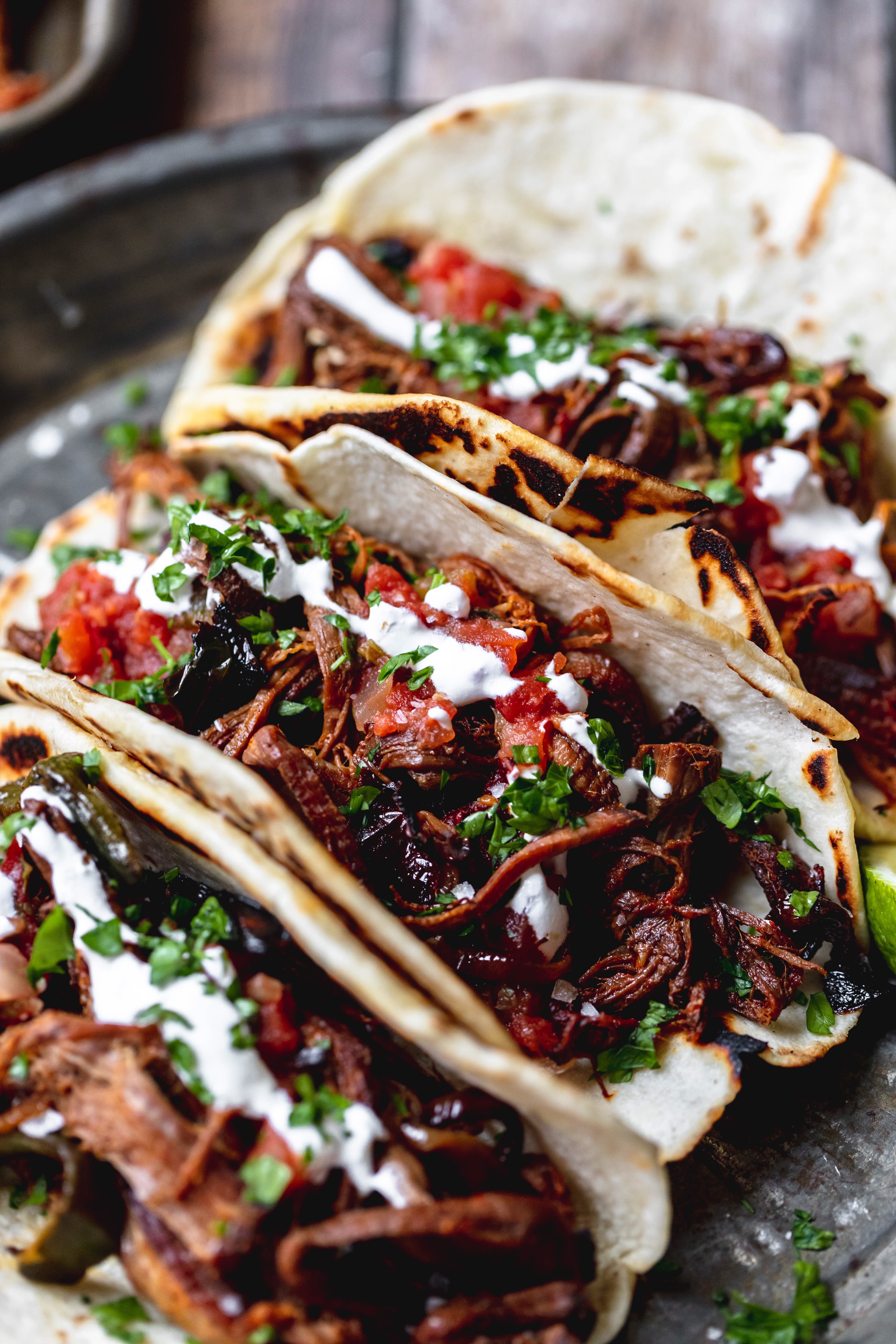 chipotle beer braised beef tacos close up
