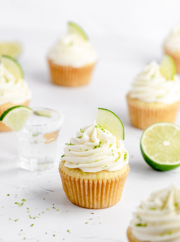close up of margarita cupcakes with tequila shot