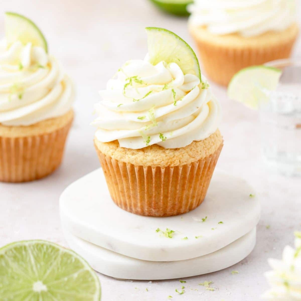 close up shot of boozy margarita cupcakes.