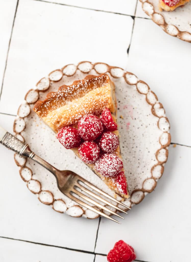 slice of raspberry almond tart