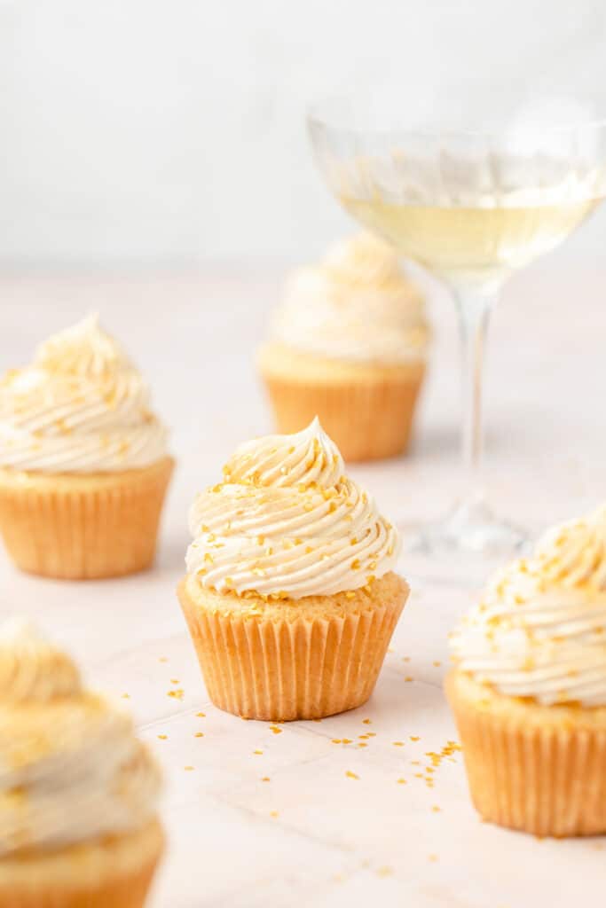 champagne cupcakes with glass of champagne 