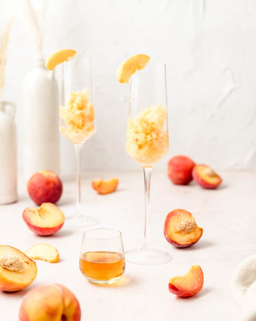 frozen peach puree in champagne flute