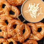 close up shot of sourdough pretzels with beer cheese
