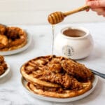 close up shot of sourdough chicken and waffles