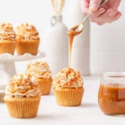 closeup shot of brown butter salted caramel cupcakes with caramel drizzle