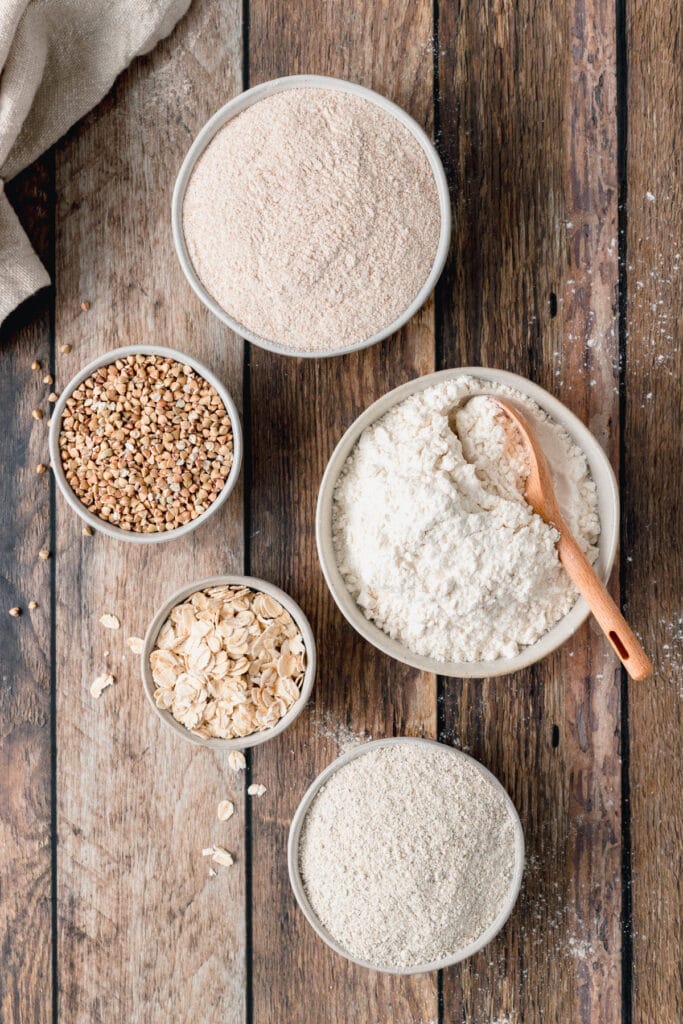 different types of flours in small bowls