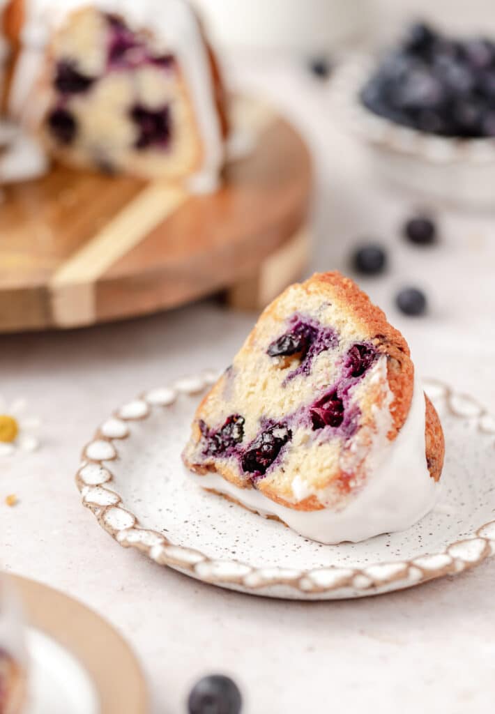 slice of blueberry Bundt with visible blueberries