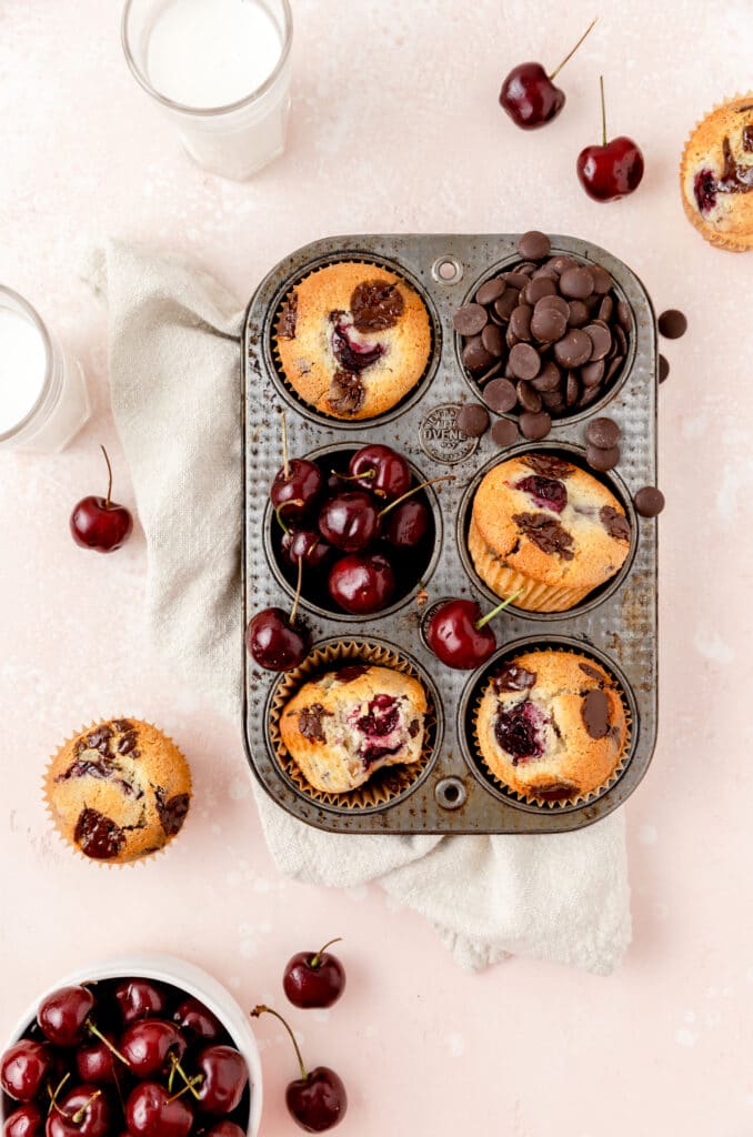chocolate cherry muffins in muffin tin