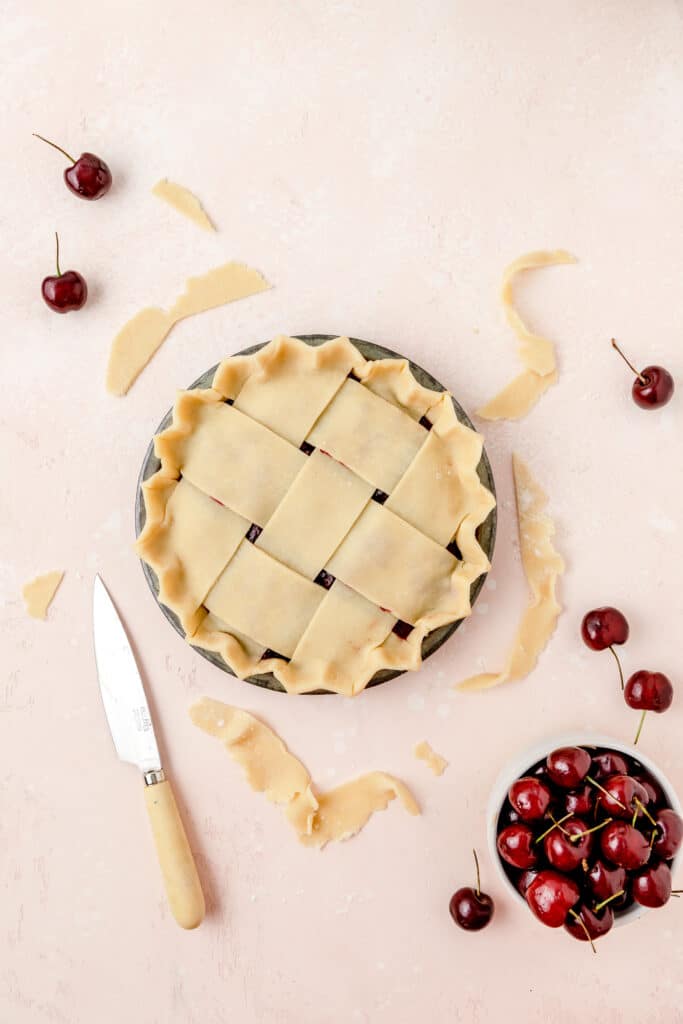 cherry pie with lattice pie crust before baking