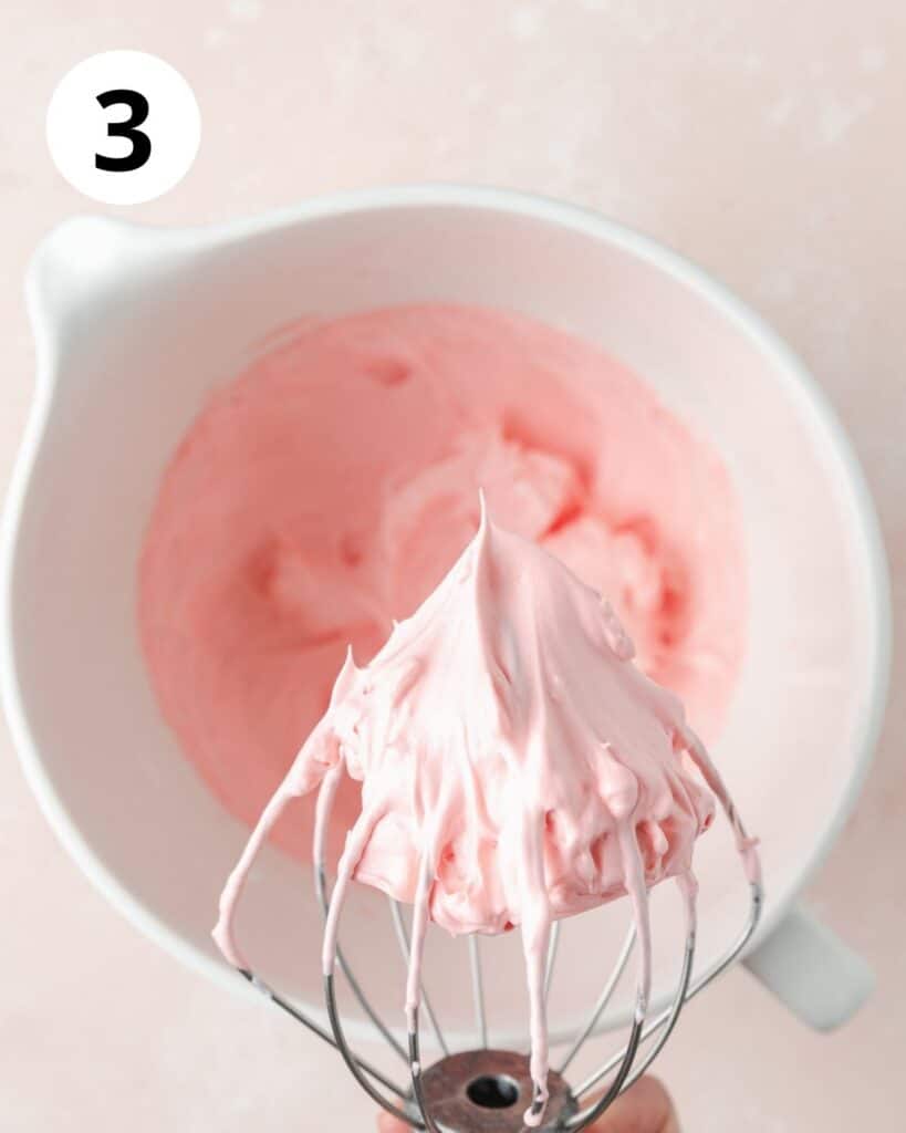 pink meringue whipped to stiff peaks