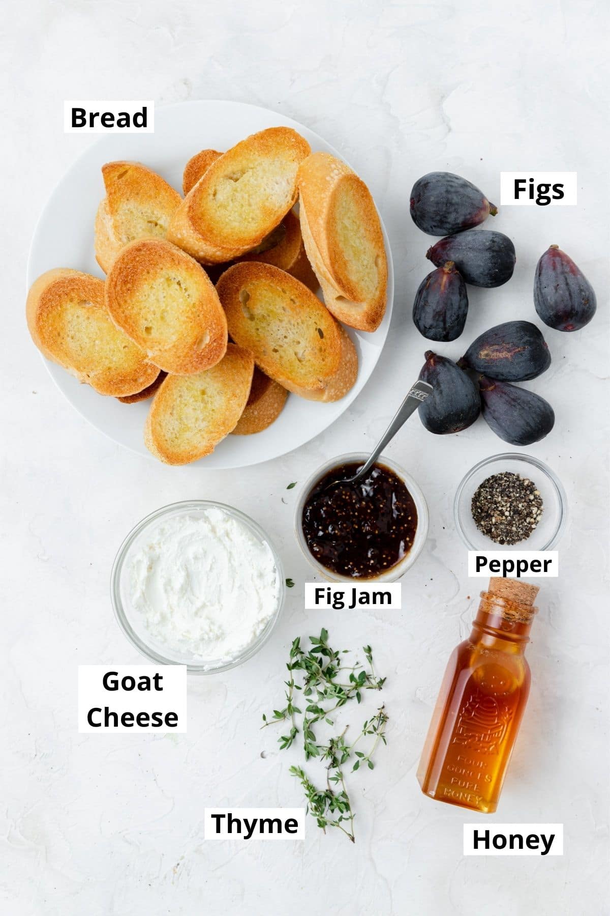 labeled shot of fig and goat cheese crostini ingredients 