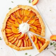 close up shot of peach and thyme galette
