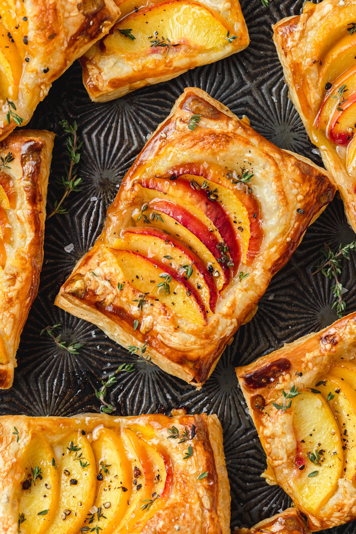 peach thyme tarts with gruyere and puff pastry