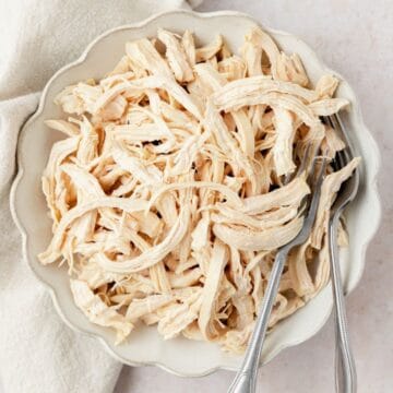 close up shot of shredded poached chicken