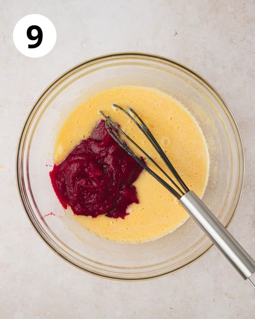 adding cranberry puree to whisked sugar and eggs