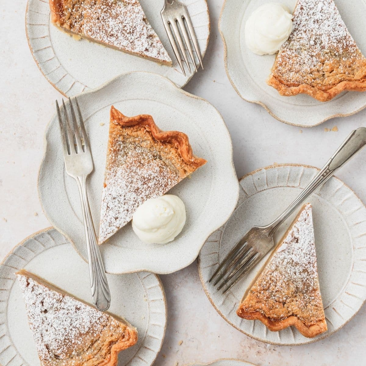 close up shot of slices of brown butter bourbon chess pie