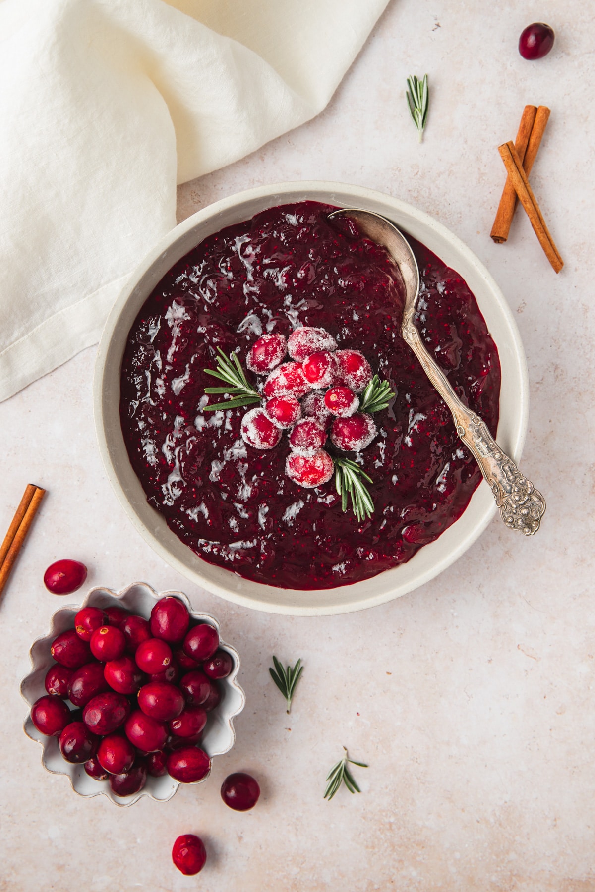 homemade cinnamon cranberry sauce with sugared cranberries on top!
