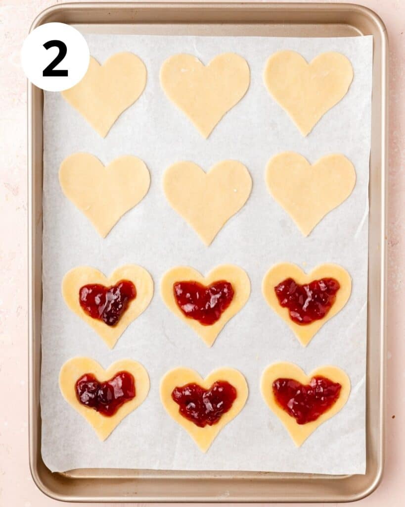 strawberry jam spooned in half the hearts.