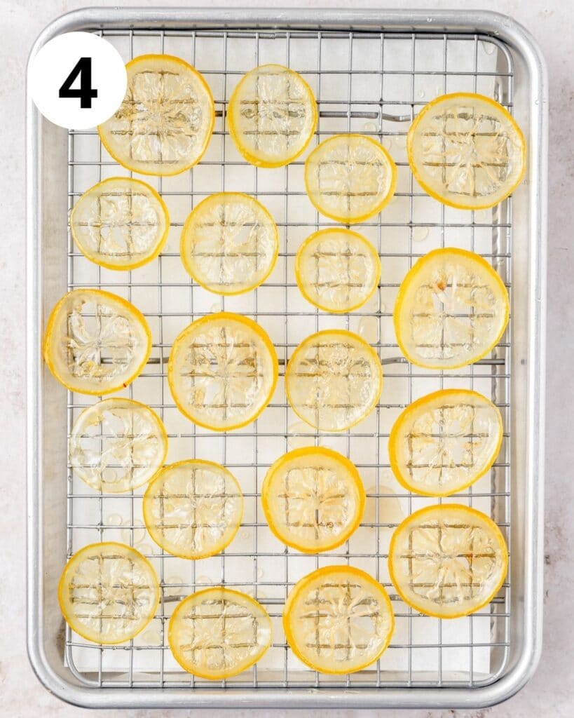 sticky lemon slices drying on wire rack