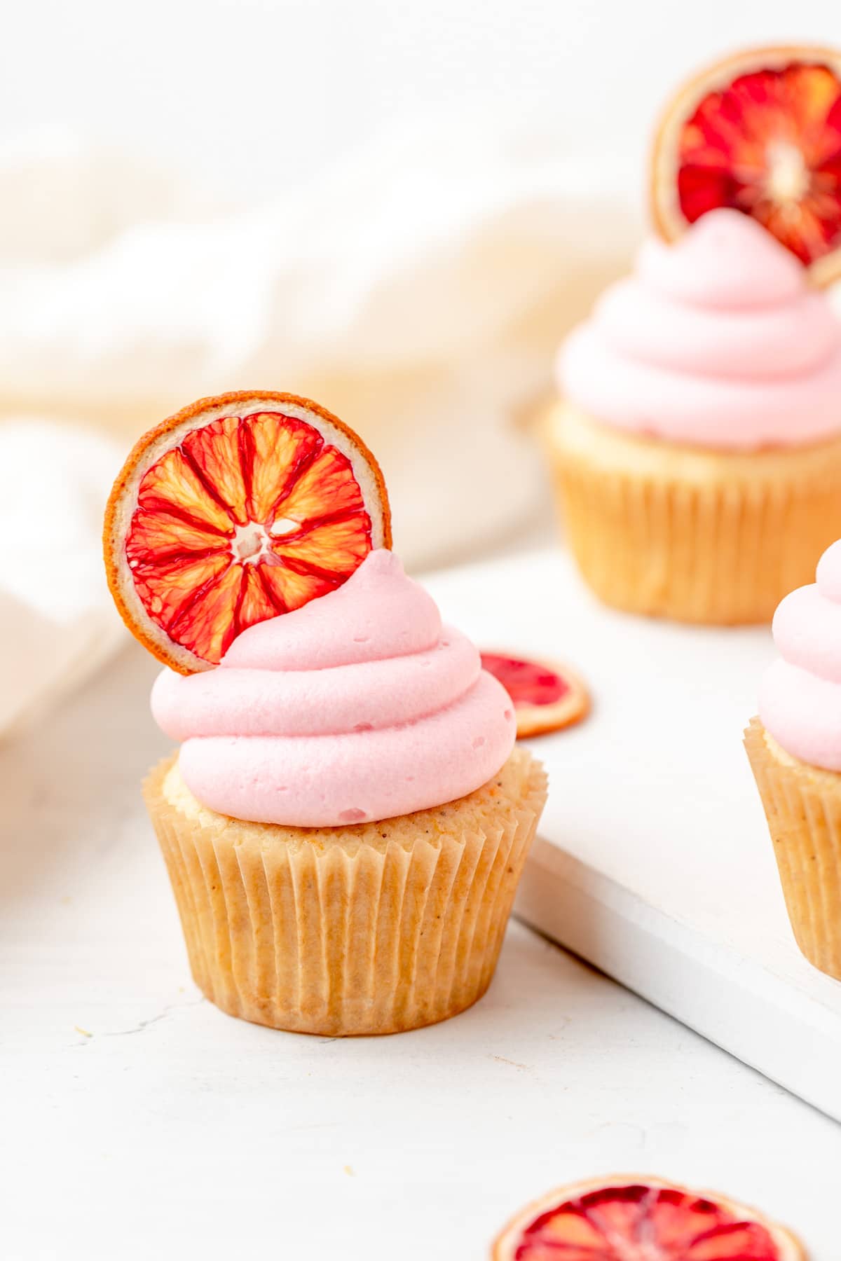 blood orange slices on cupcakes