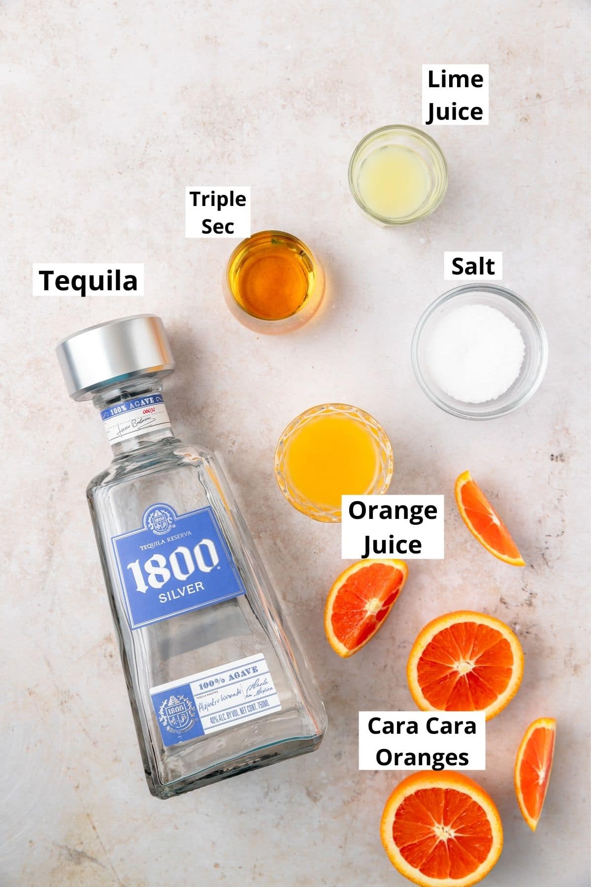labeled shot of ingredients for cara cara orange margarita.