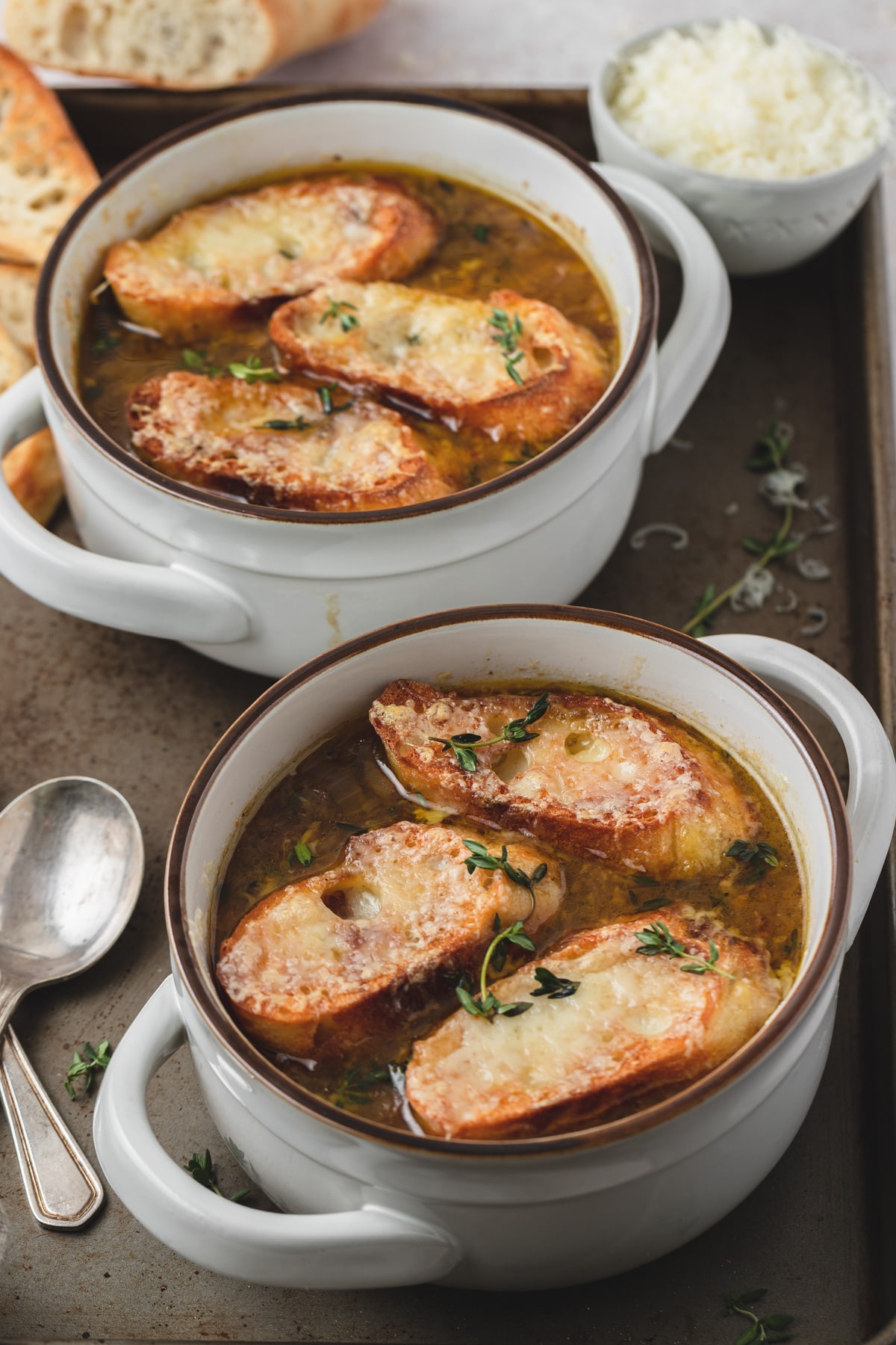french onion soup with cheesy croutons on top