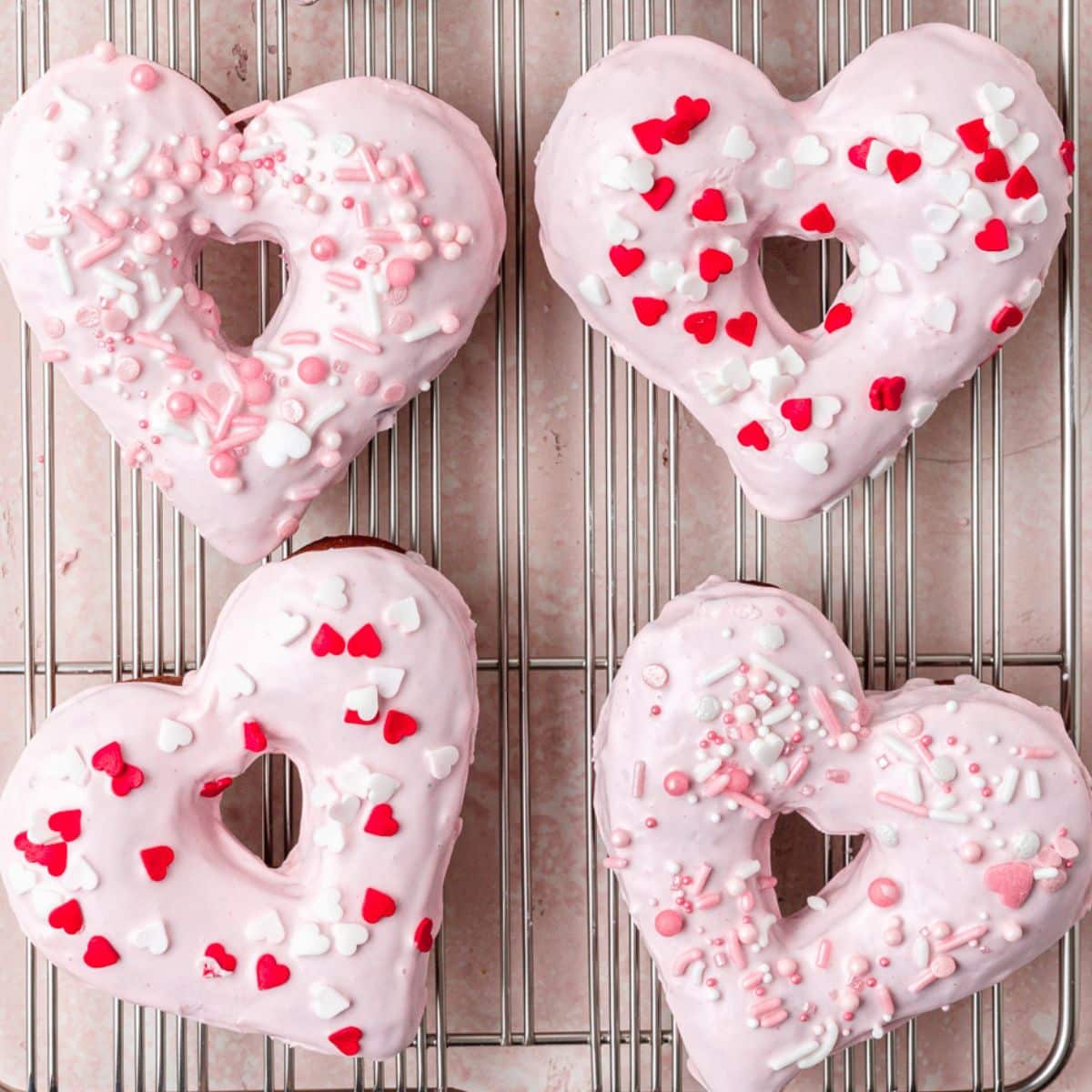 close up shot of heart shaped donuts.