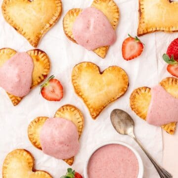 close up shot of heart shaped strawberry hand pies
