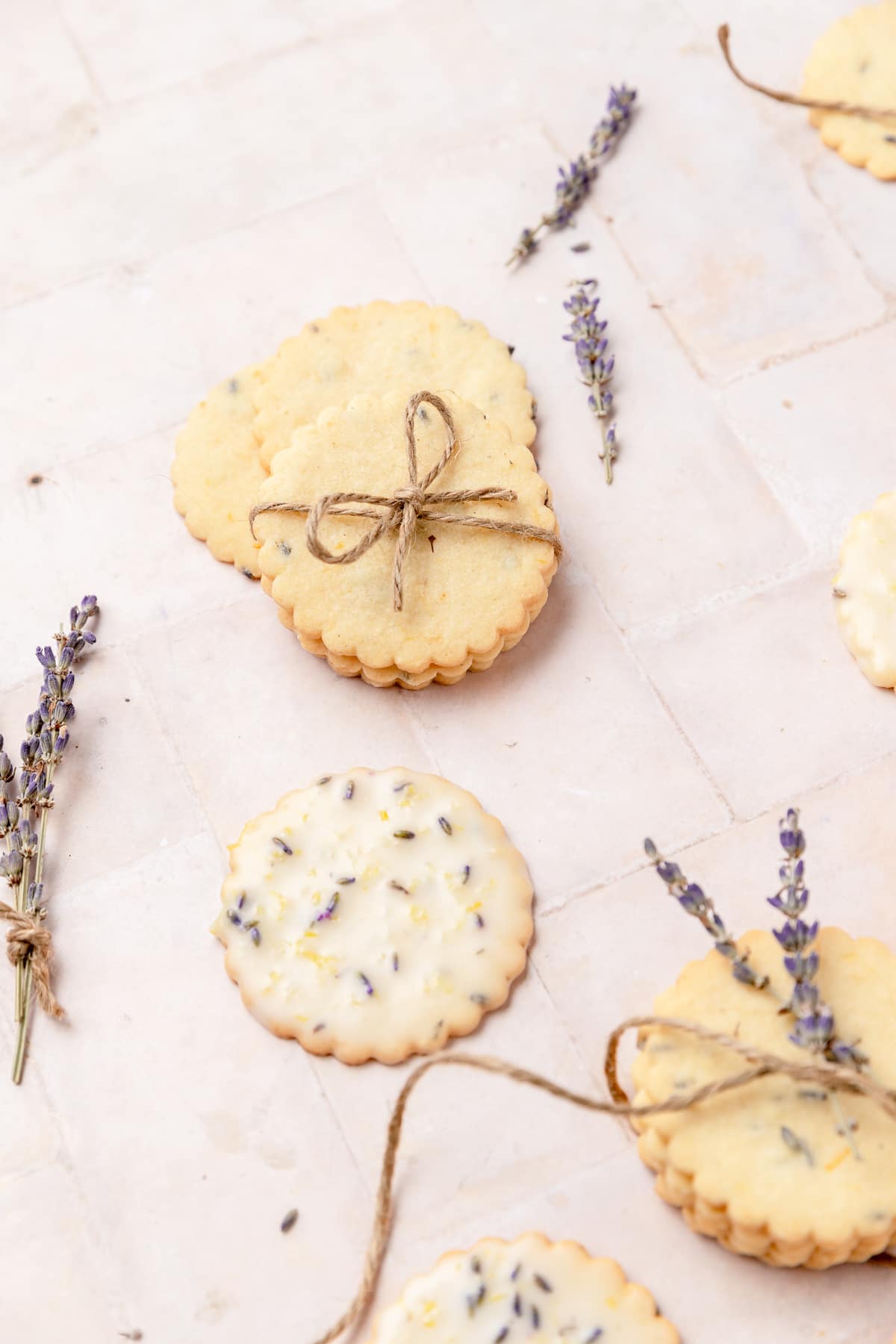 lemon lavender cutout cookies with stack tied in bow.