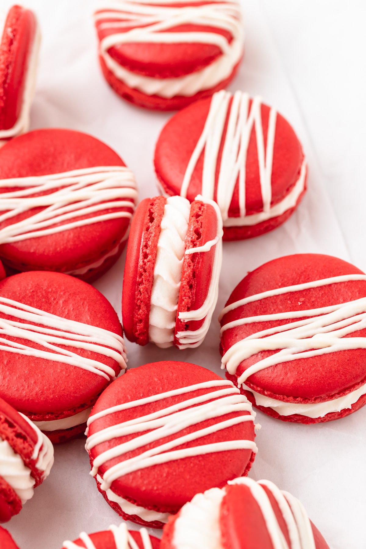 vibrant red velvet macarons with cream cheese filling