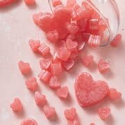 close up shot of heart shaped rose gummies