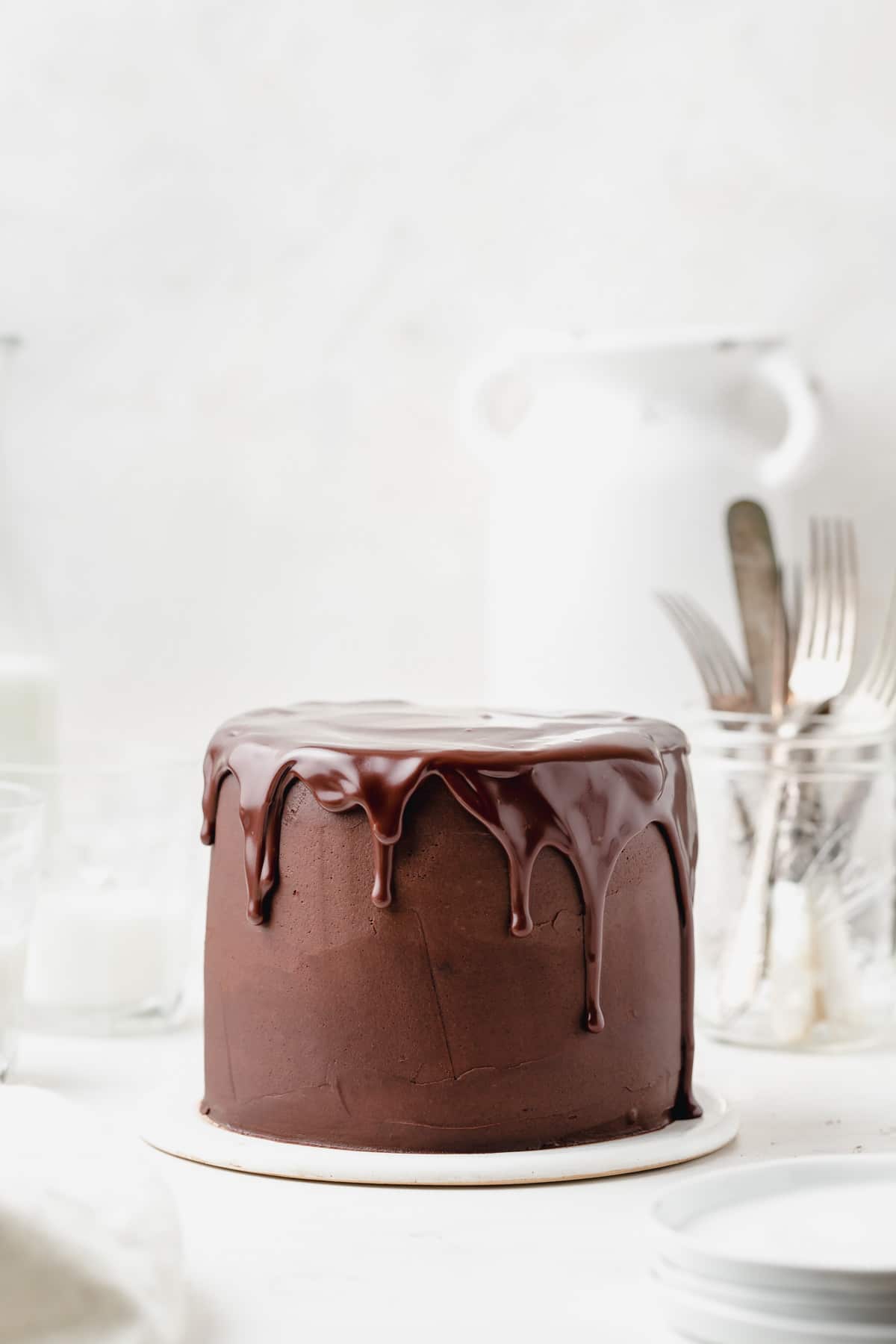triple chocolate layer cake with dark chocolate drip