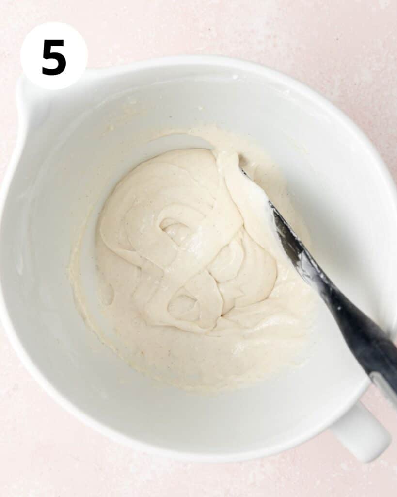 lavender macaron batter forming figure 8