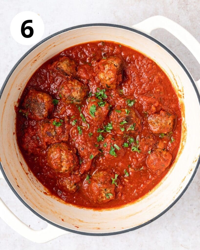 cooked italian meatballs in homemade tomato sauce.