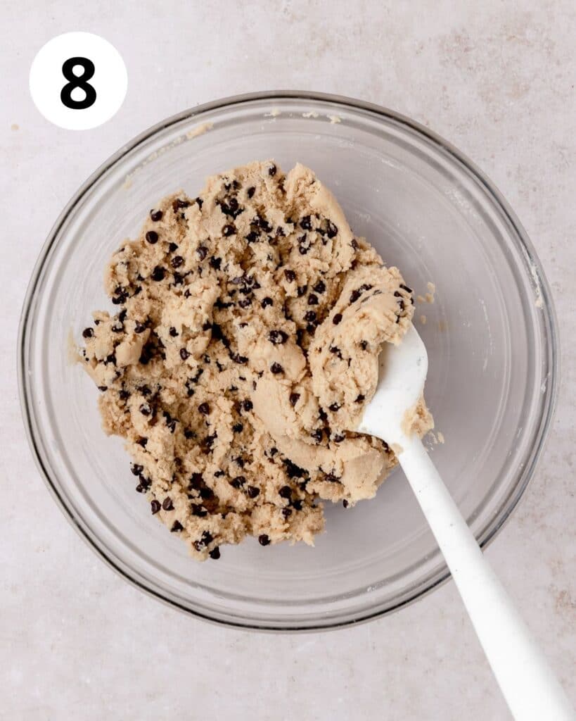 edible brown butter chocolate chip cookie dough in bowl. 