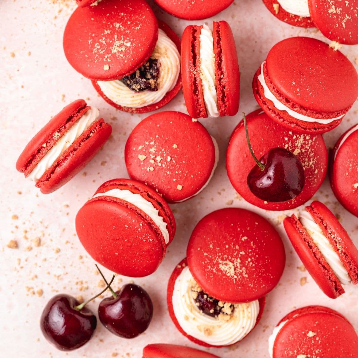 close up shot of cherry cheesecake macarons.