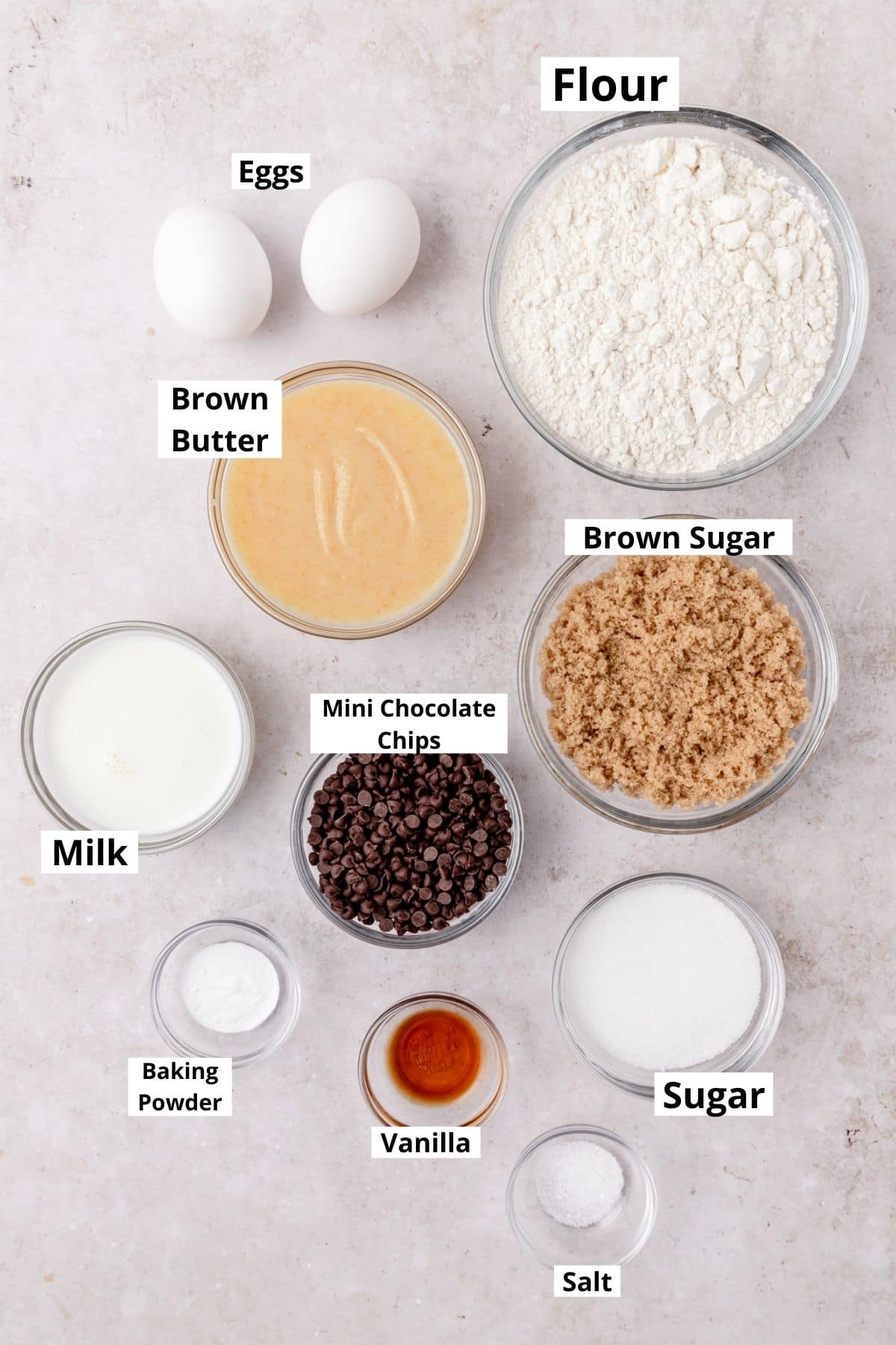 labeled shot of ingredients for cookie dough cupcakes.