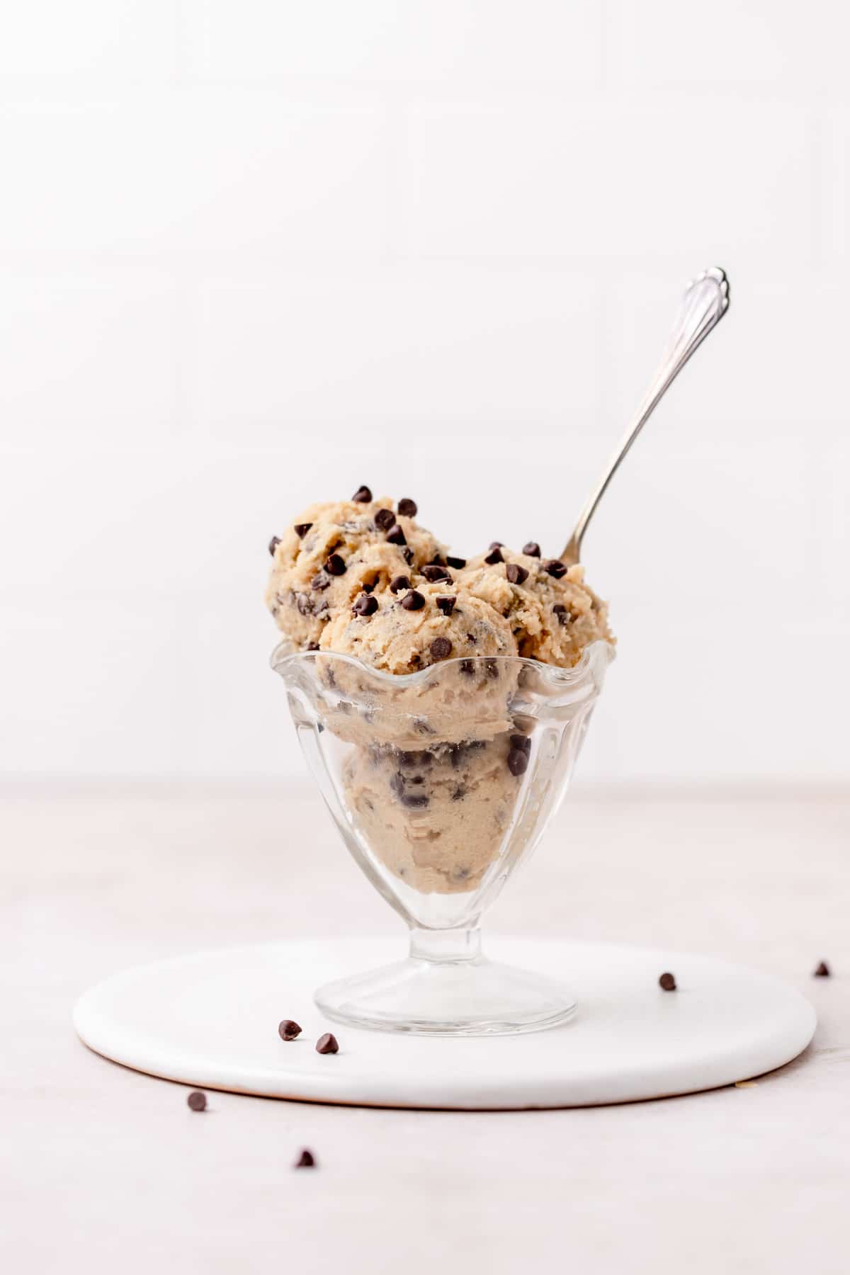 ice cream glass full of edible chocolate chip cookie dough.