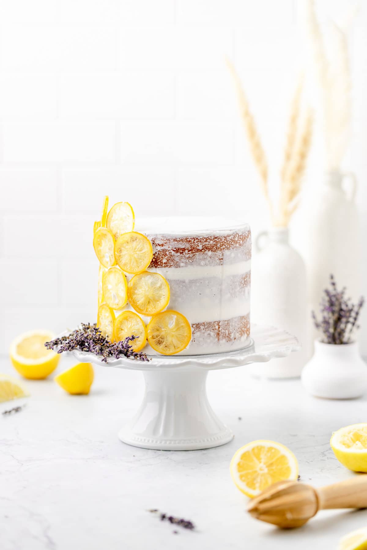 lemon lavender layer cake with candied lemons and dried lavender.