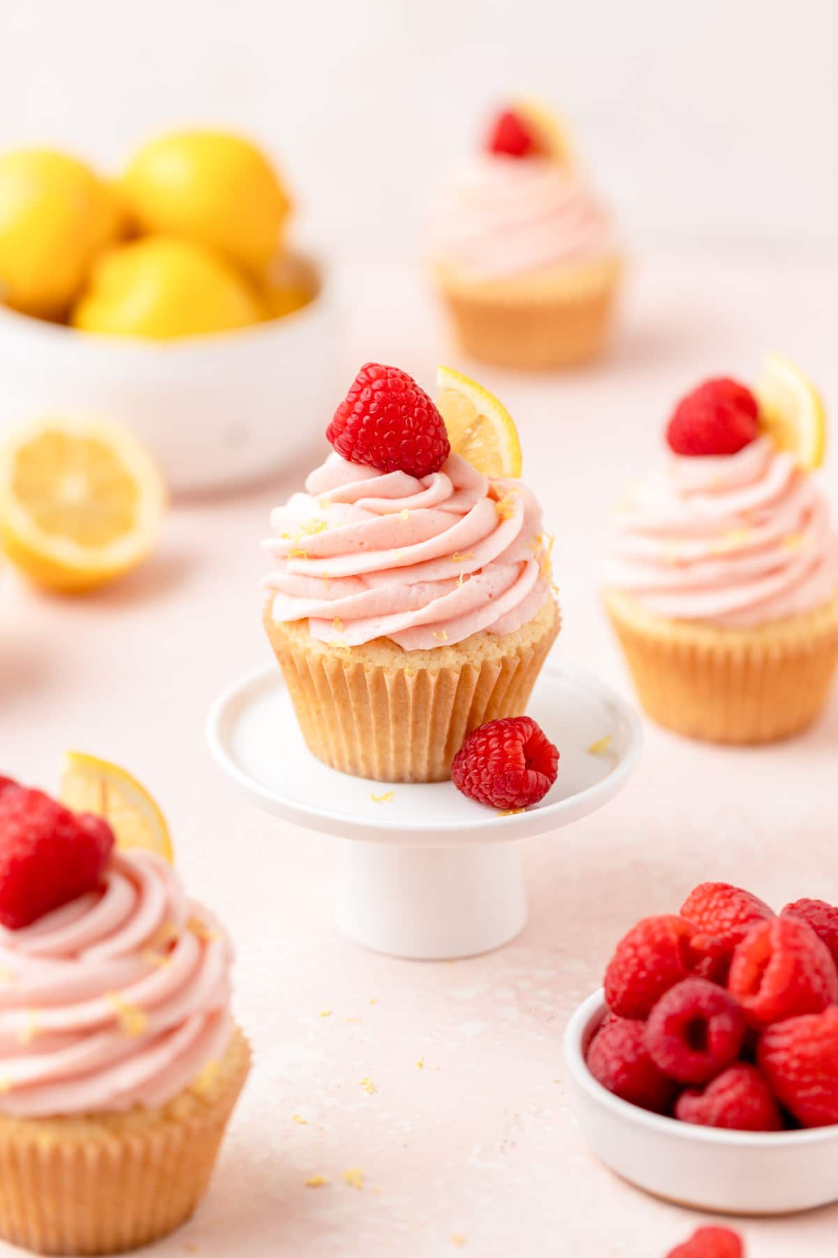 lemon cupcakes with raspberry filling and mascarpone frosting.