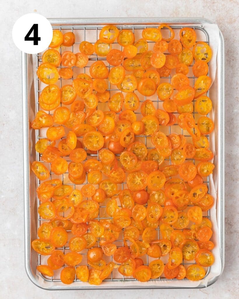 candied kumquat slices on cooling rack.