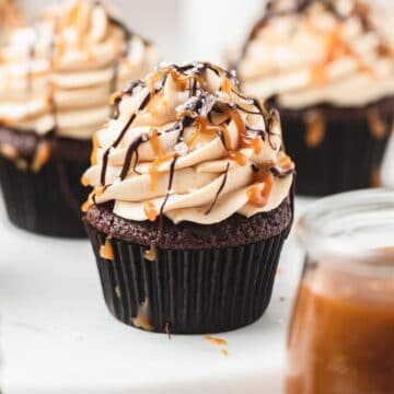 close up shot of caramel filled chocolate cupcakes.