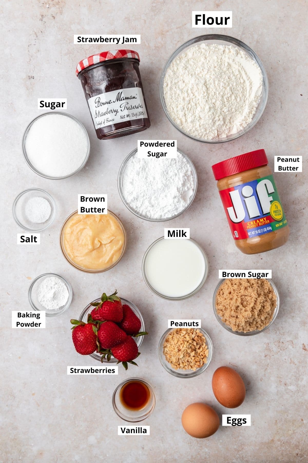 labeled shot of ingredients for peanut butter and jelly cupcakes.