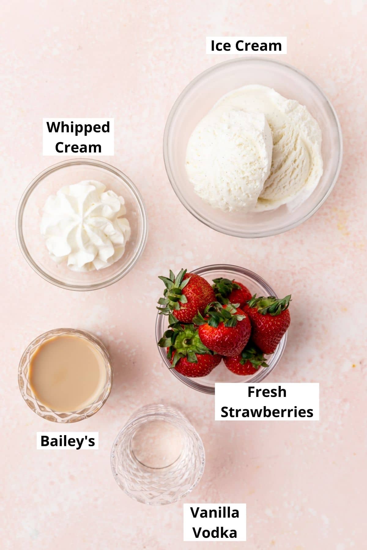 labeled shot of ingredients for strawberries and cream cocktail.